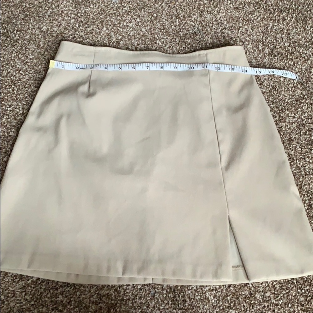 Tan/ beige mini skirt with slit